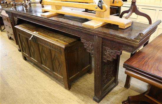 A large Chinese dark stained softwood altar table, width 9ft 9in.